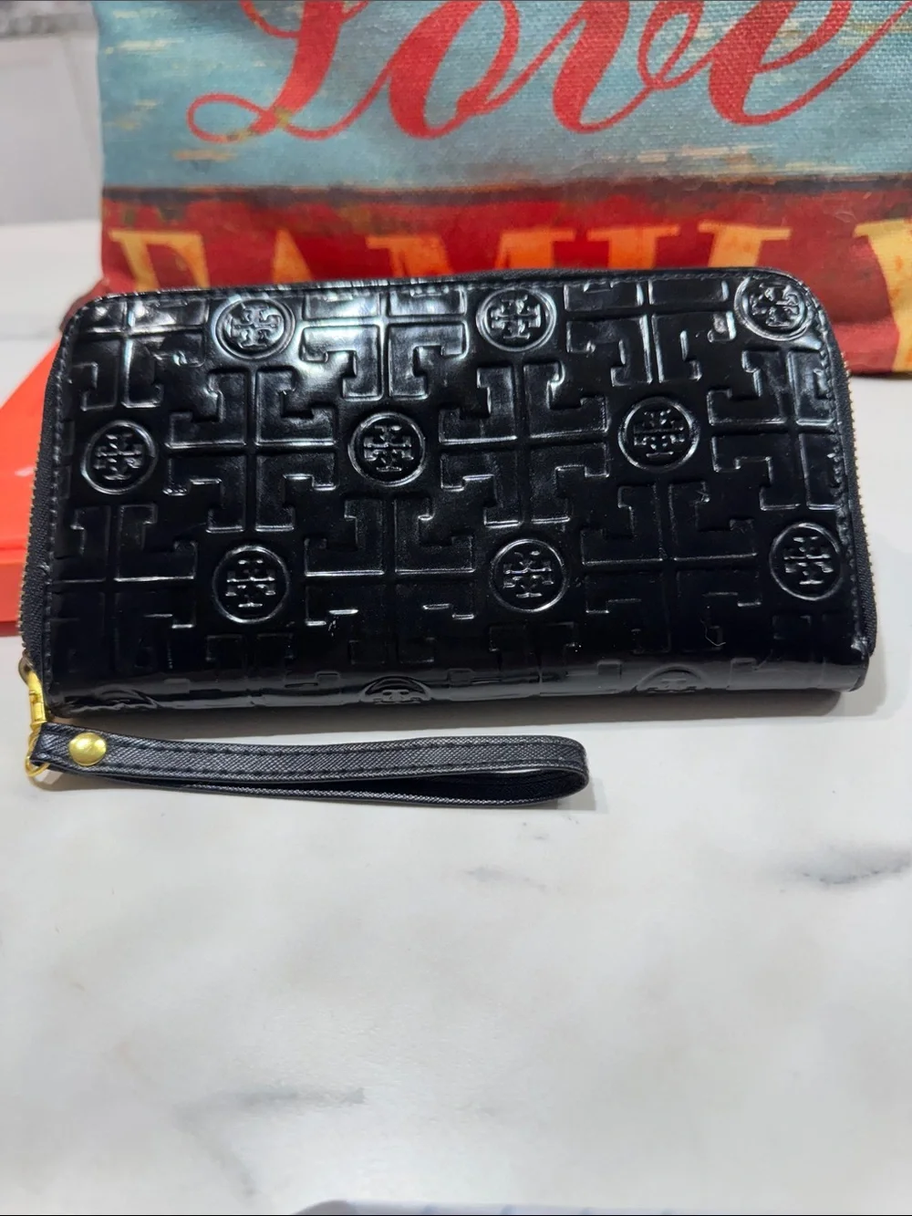 Black Wallets Embossed Zip Wristlet